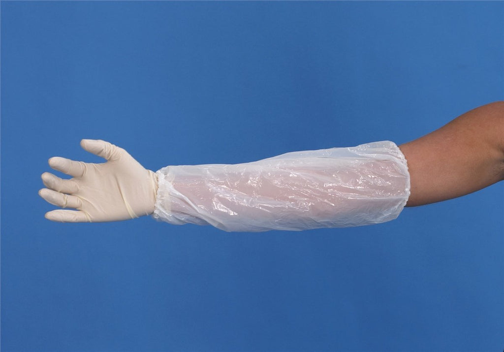 A clear plastic protective sleeve worn over a person's arm and hand, with a white nitrile glove on the wrist, set against a solid blue background.
